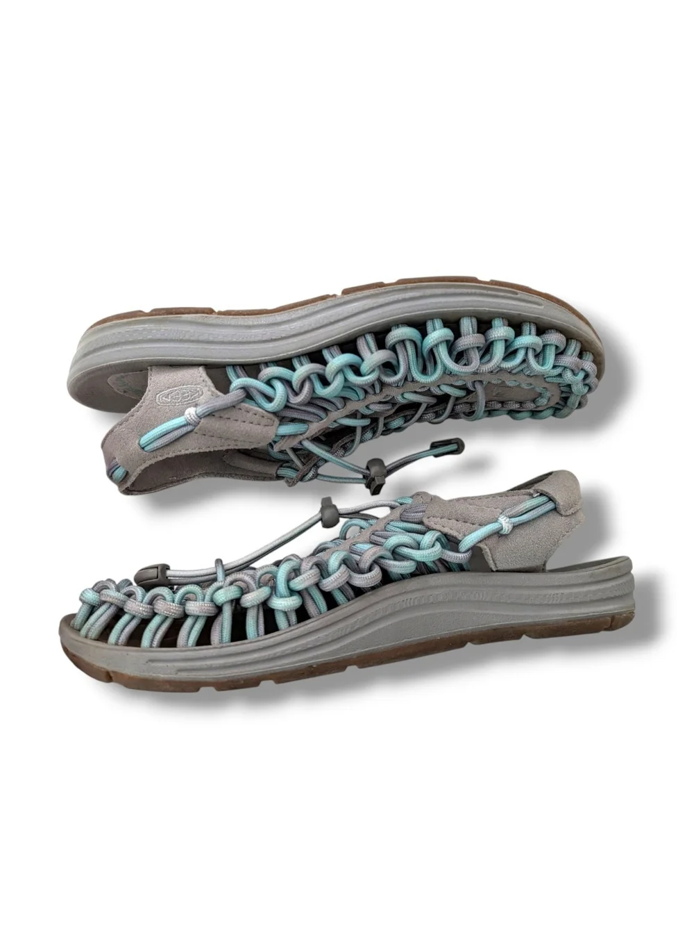 NWOT KEEN Women's Uneek open-air cord sandals in a grey and aqua blue colorway